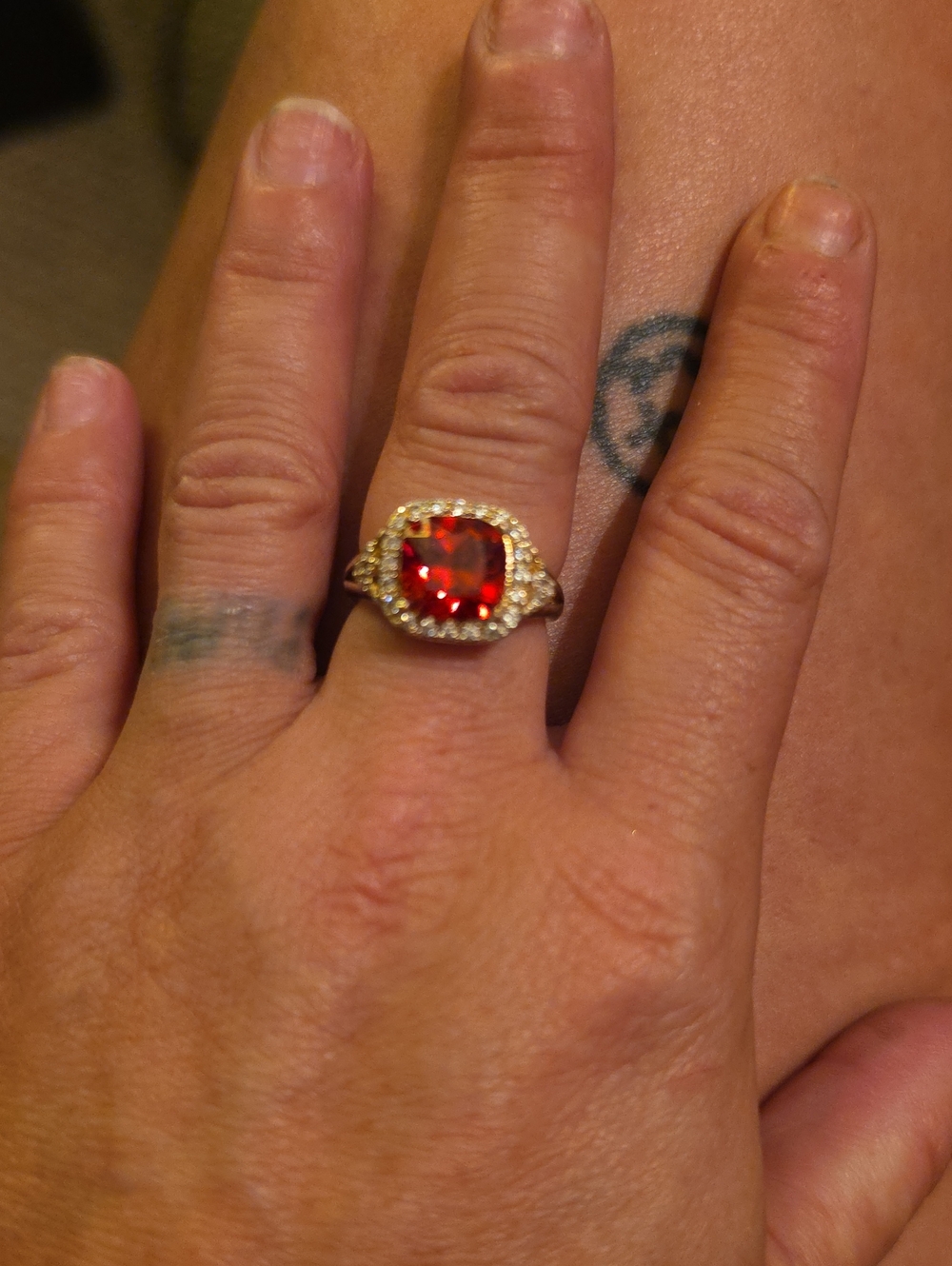 Gold Ring with Red Ruby Gemstone and Halo of Diamonds